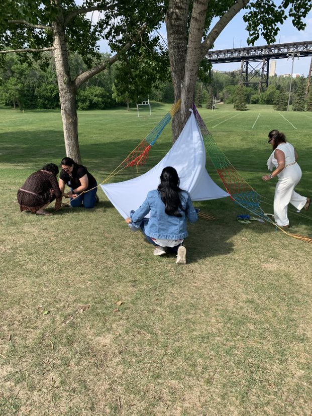 Educators setting up outdoor play