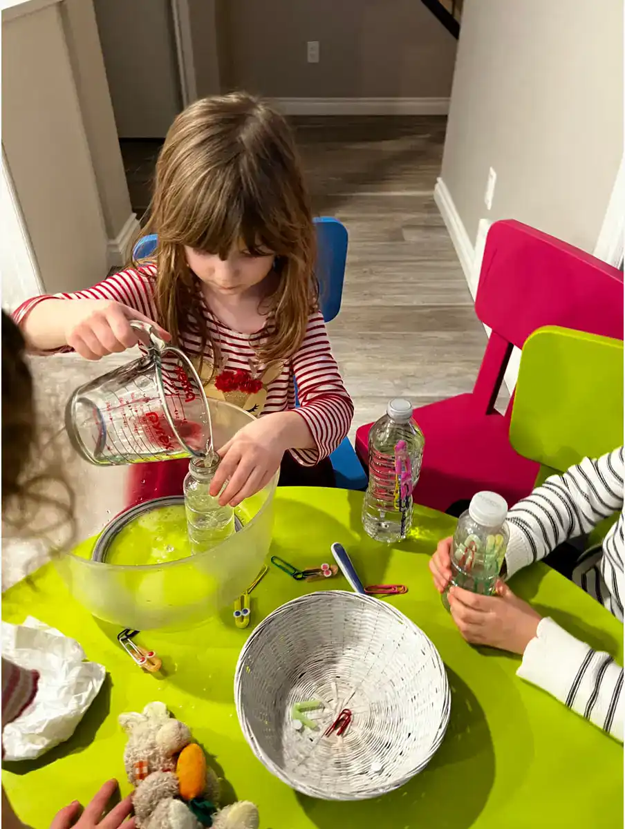 child doing science experiment